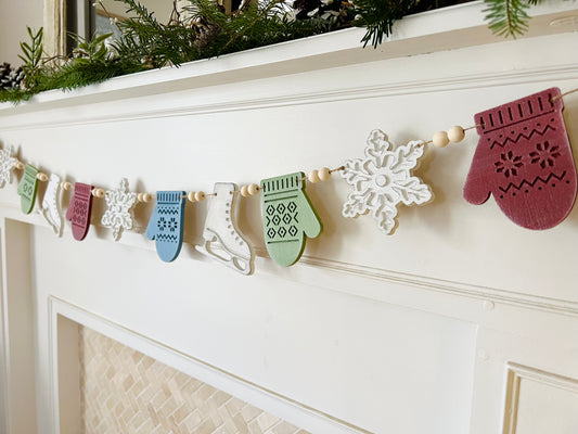 Ice skates and mittens garland holiday decoration