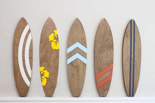 Custom wooden surfboard wall decoration for beach themed room/nursery. Choose your colors for inlaid accents.
